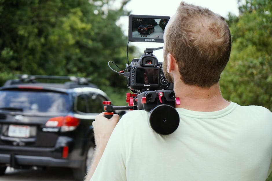 Wedding videographer filming a couple during their special day